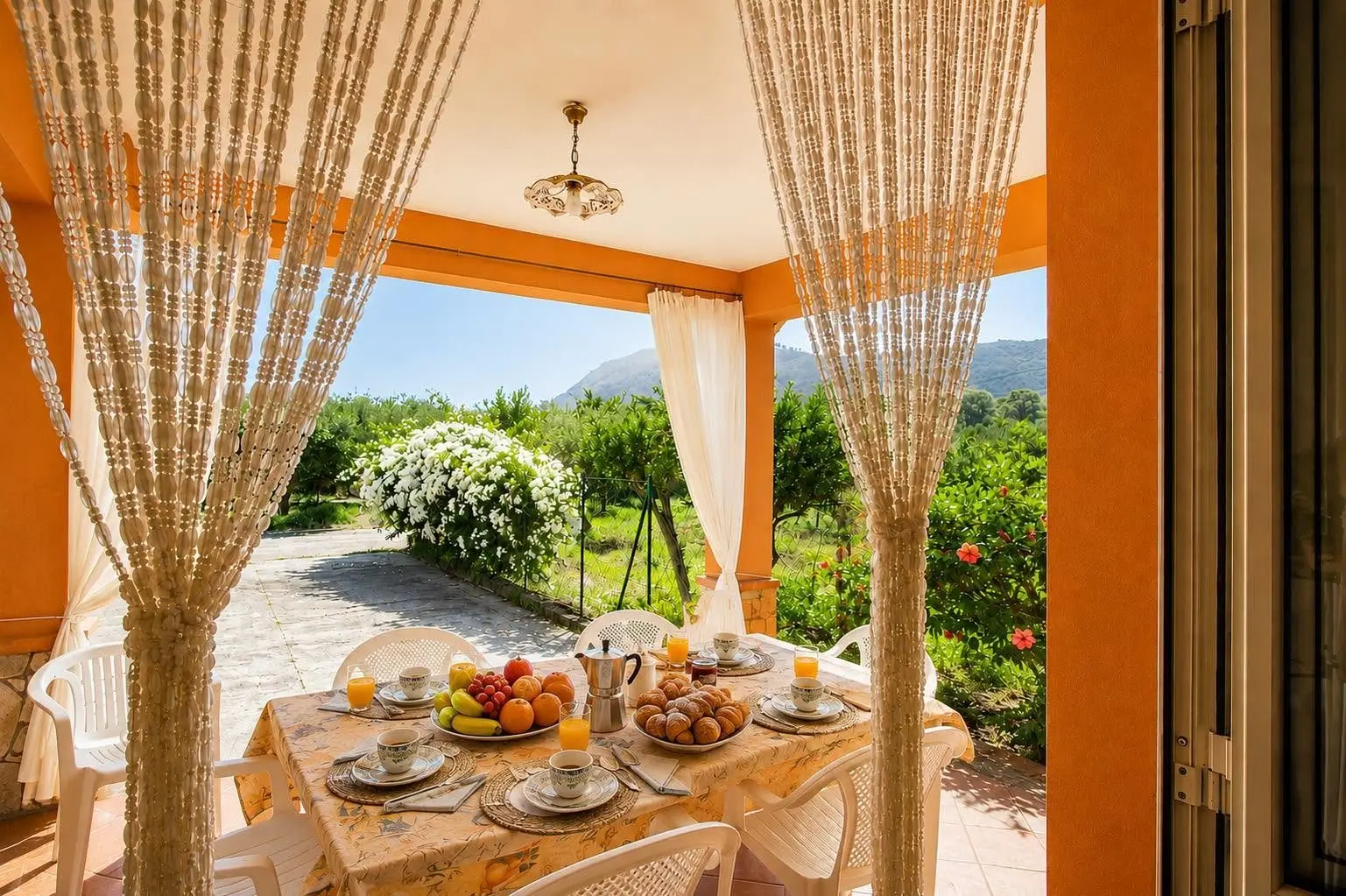 Breakfast on the veranda at Villa dei Limoni