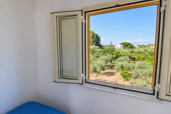View of the countryside and the sea from the window, Villa dei Mandarini, Cefalù